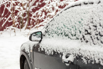 Close-up of snow on car