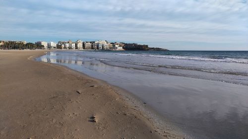 Scenic view of beach against sky