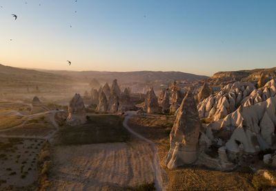 Scenic view of landscape against sky during sunset