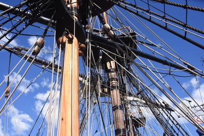 Low angle view of sailboat moored against sky