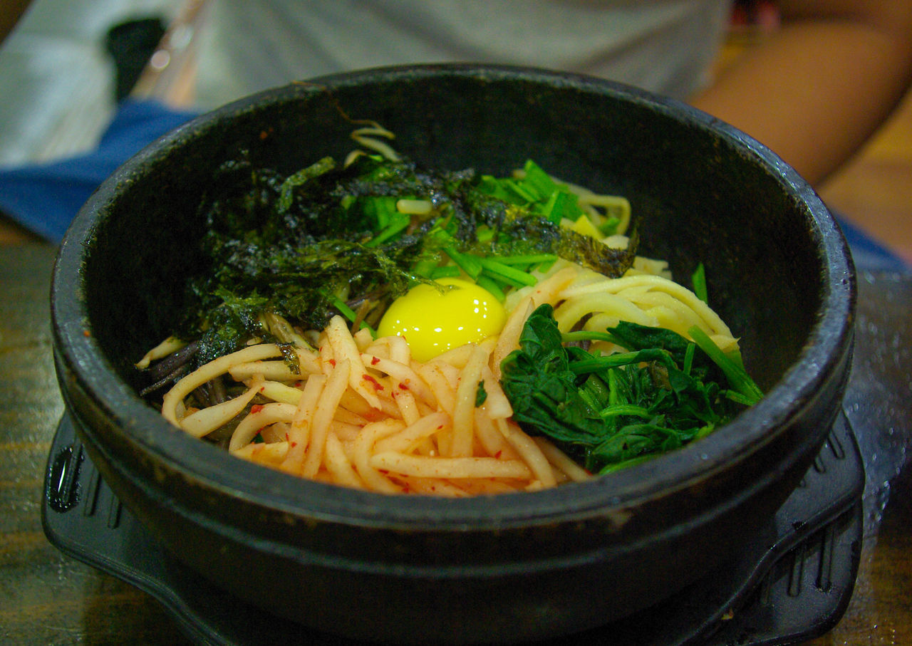 CLOSE-UP OF SOUP WITH NOODLES