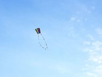 Low angle view of kite flying in sky