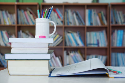 Close-up of books on table in library