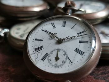 High angle view of clock on table