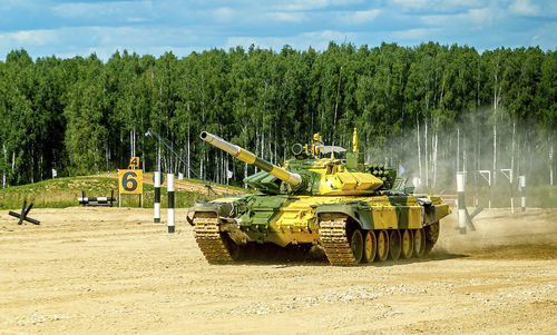 Panoramic view of machinery on field against sky