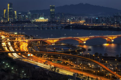 High angle view of illuminated city at night