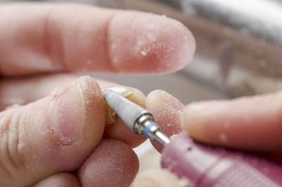 Close-up of woman hand with tattoo