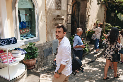 Group of people standing in front of building