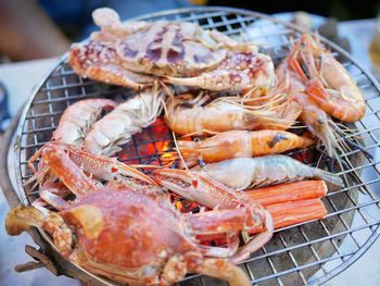 Close-up of meat on barbecue grill