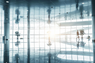 People walking in modern building
