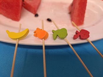 High angle view of multi colored candies on table