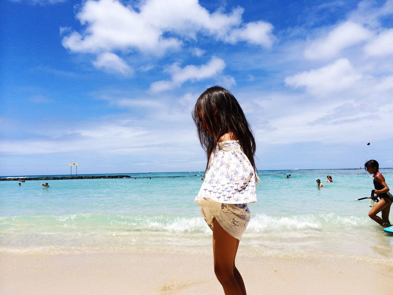 sea, beach, water, horizon over water, sky, lifestyles, leisure activity, shore, sand, rear view, standing, vacations, person, cloud - sky, scenics, casual clothing, nature, tranquil scene