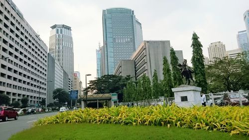 Buildings in city against sky