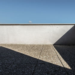 Low angle view of wall against clear sky