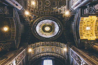 Low angle view of illuminated ceiling of building