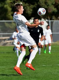 Man playing soccer on field