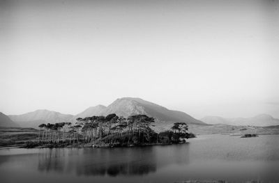 Scenic view of lake with mountains in background