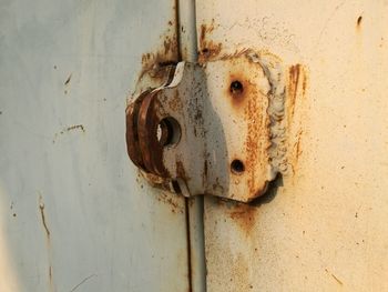 Close-up of old rusty metal door