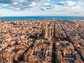 Aerial view of townscape against sky