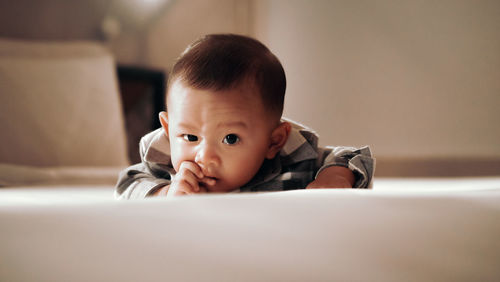 Portrait of cute boy at home