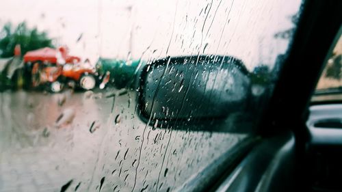 Close-up of water drops on car windshield