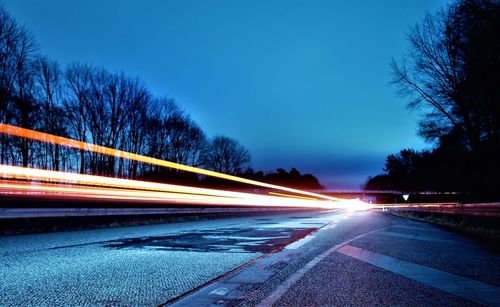 Light trails on road at night