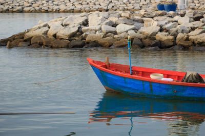 Boats moored at shore