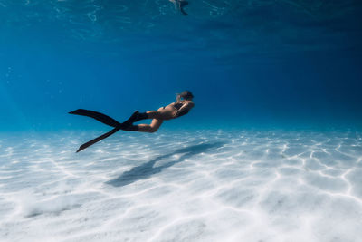 Man swimming in sea