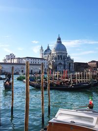 Boats moored at dock