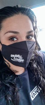 Close-up portrait of smiling young woman