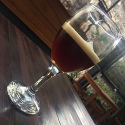 Close-up of beer glass on table