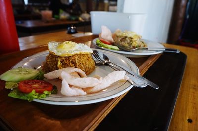 Close-up of food served on table