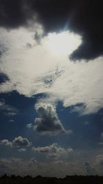 Scenic view of clouds over landscape