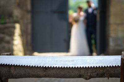 Close-up of chain on railing