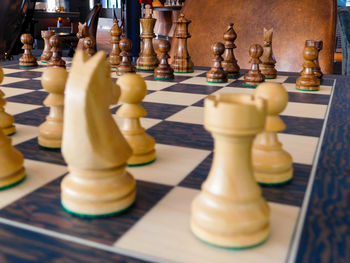 Close-up of chess pieceson board