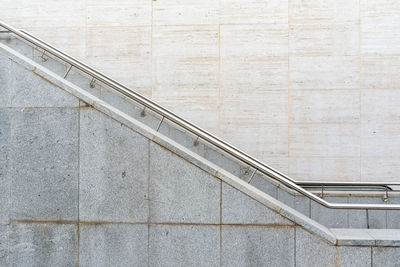 High angle view of steps by wall