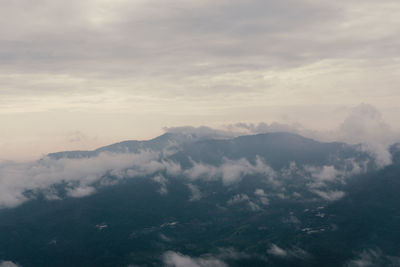 Aerial view of mountains against sky during sunset