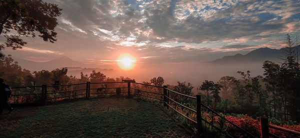 Scenic view of mountains against sky during sunset