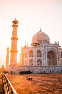 Taj mahal against sky during sunset