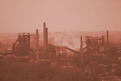 View of factory against sky