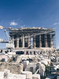 People at construction site in city