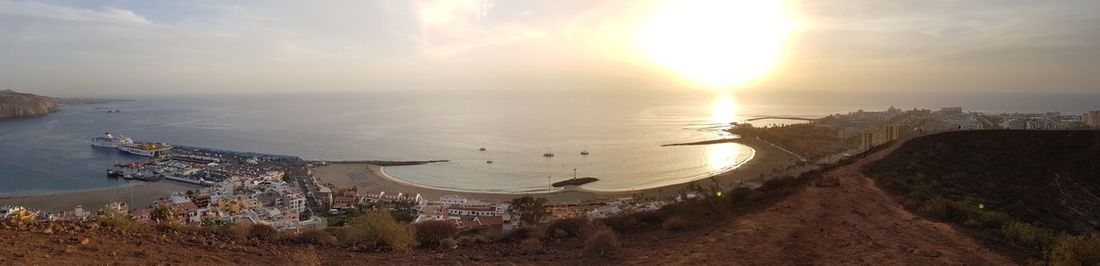 High angle view of sea against sky during sunset