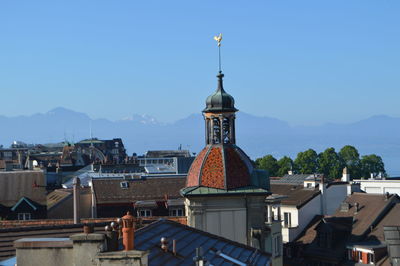 Cityscape against clear blue sky