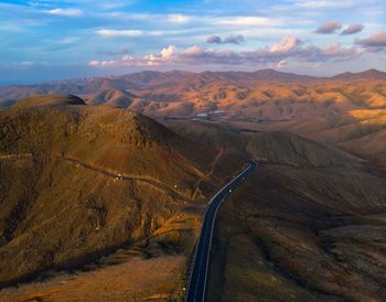 High angle view of road amidst landscape against sky