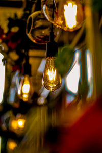 Close-up of illuminated light bulb