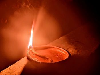 Close-up of lit candle