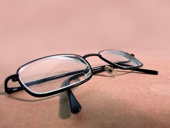 Close-up of eyeglasses on table