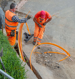High angle view of man working on road