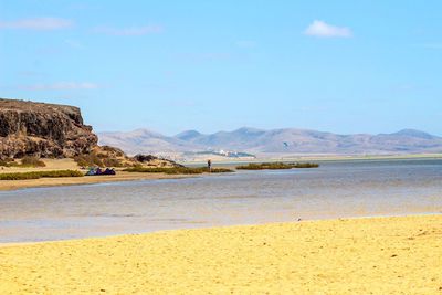 Scenic view of beach against sky