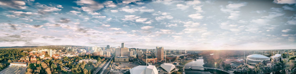 High angle view of city buildings against sky